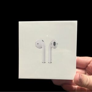 Apple AirPods (2nd Generation) with a Wireless Charging Case - New in Box